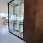 Bespoke wine cellar specialist. Perspex racks.